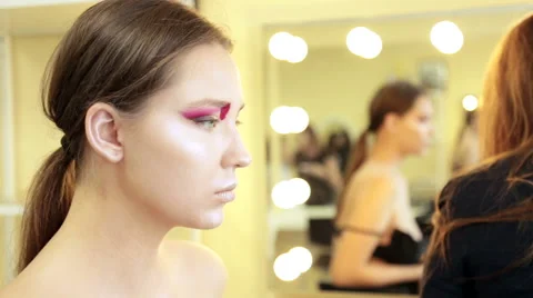 Make-up artist in the process of creating an image Stock Footage 68460514