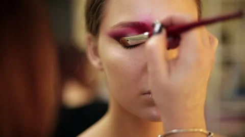 Make-up artist in the process of creating an image Stock Footage 68460999