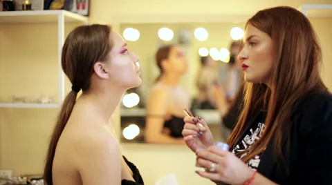 Make-up artist in the process of creating an image Stock Footage 68461241