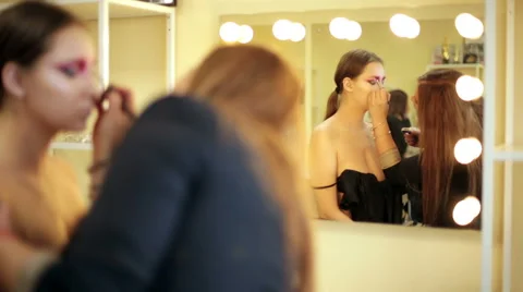 Make-up artist in the process of creating an image Stock Footage 68461599
