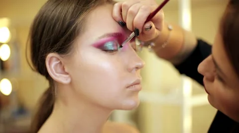 Make-up artist in the process of creating an image Stock Footage 68461766