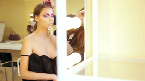 Make-up artist in the process of creating an image Stock Footage 68461864