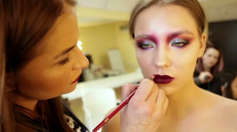 Make-up artist in the process of creating an image Stock Footage 68462166