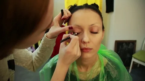 Make-up artist puts on make-up Stock Footage 74350242