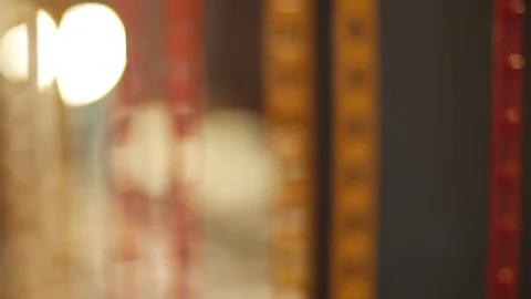 Make-up artist putting on make-up on model's eyes.Eyelids make-up close up shot Stock Footage 75700775