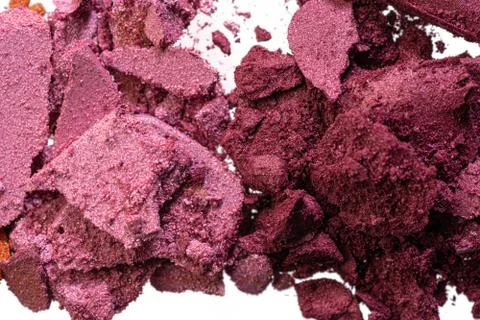 Make up background of mixed colored smashed eyeshadows Stock Photos