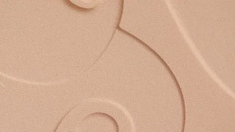 Make-up beige foundation with pattern, rotating. Cosmetic bb cream Close-up Stock Footage 169600290