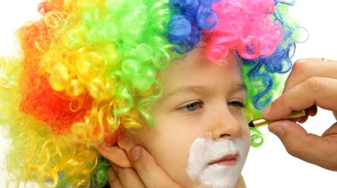 Make-up boy in clown wig Stock Footage 47631483