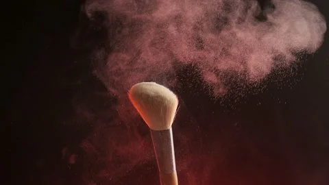 Make up brush and colored powder particles exploding. Close-up, phantom flex 4K Stock-Footage 194395757
