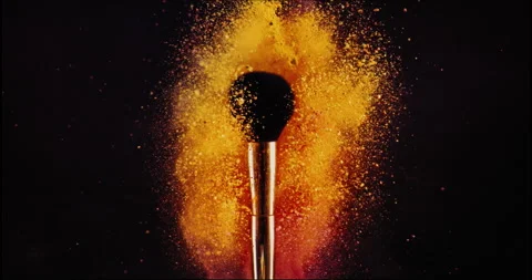 Make up brush and colored powder, particles exploding. Stock Footage 245272239