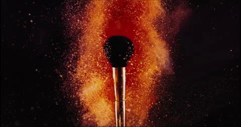 Make up brush and colored powder, particles exploding. Stock Footage 245272586