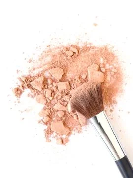 Make-up brush and crushed face powder Foto stock