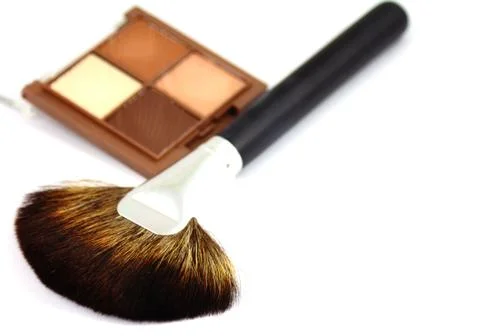 Make up brush and eyeshadows Stock Photos