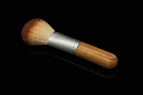 Make up brush on black background Foto stock