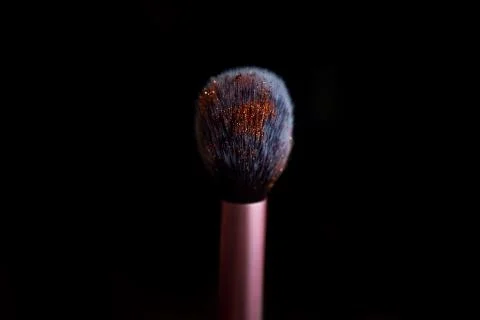 Make up brush close up dark background Stock Photos