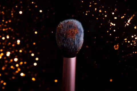 Make up brush close up dark background Stock Photos