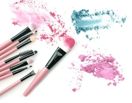 Make-up brush with colorful crushed mixed colors eyeshadows Foto stock
