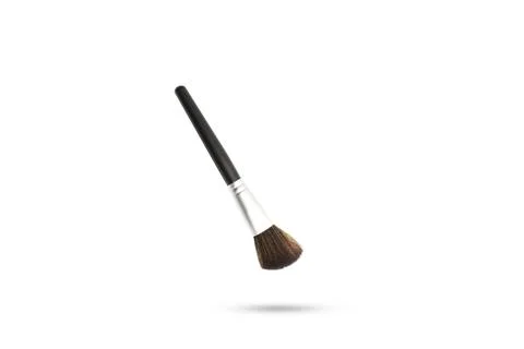 Make up brush floating on a white background with copy space Stock Photos