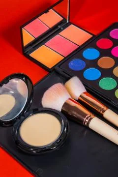 Make up Brush  on a red background. Stock Photos