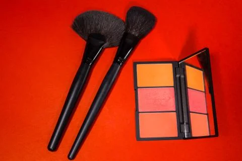 Make up Brush  on a red background. Stock Photos