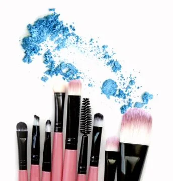 Make up brush set with eye shadow powder. Isolate. Stock Photos