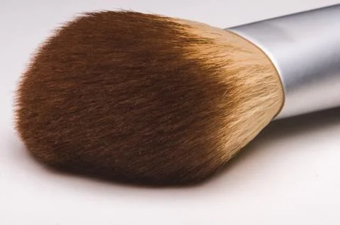Make-up brush on white background. Stock Photos