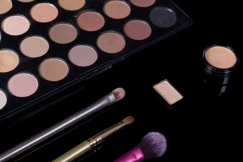 Make-up brushes. Eye shadow palette. Makeup kit. Cosmetic set. Beauty, fashio Stock Photos