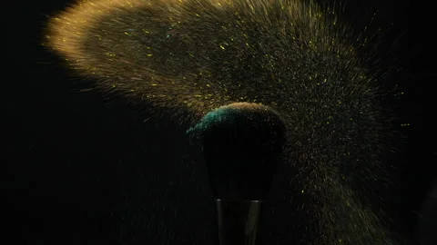 Make-up brushes with glitter golden and green color eye shadow powder Stock Footage 170359024