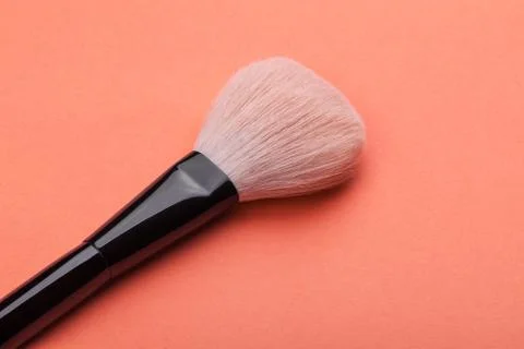 Make-up brushes on grey background Stock Photos