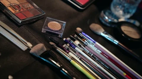 Make-up brushes laid out on the table Stock Footage 244117999