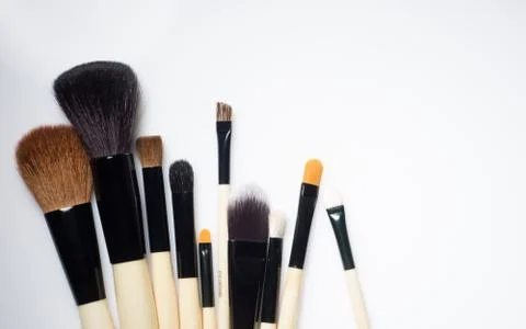 Make-up Brushes lying on white background Foto stock