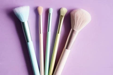 Make up brushes pattern on pink Stock Photos