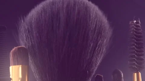 Make-up Brushes set over black holiday blinking background Stock Footage 153027227