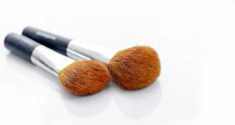 Make up brushes on a white background. Stock Photos