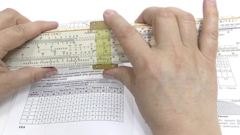 Make calculations on a logarithmic ruler. Stock Footage 108632159