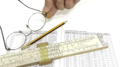 Make calculations on a logarithmic ruler. Stock Footage 108637908