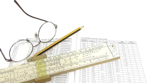 Make calculations on a logarithmic ruler. Video stock 108637978