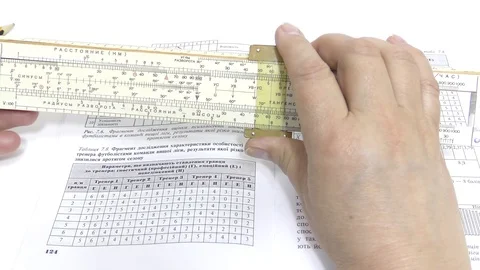 Make calculations on a logarithmic ruler. Stock Footage 108639019