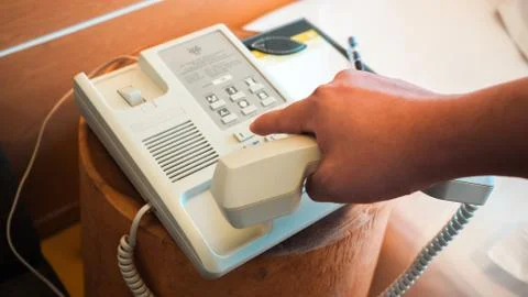 Make Call the hotel phone Stock Photos