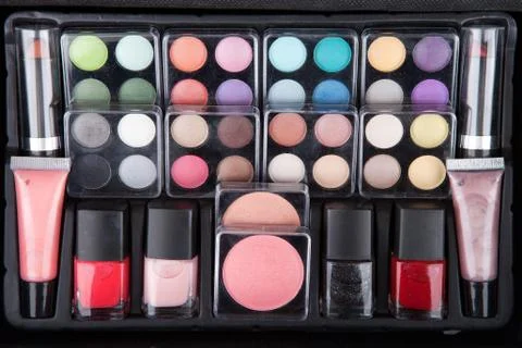 Make up case containing colorful eyeshadows, lipsticks, lip glos Stock Photos