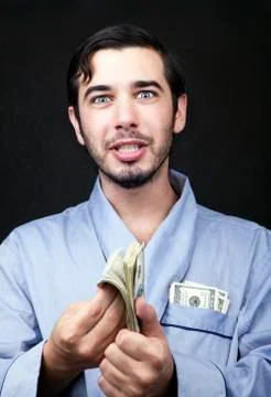 Make cash in your robe! Stock Photos