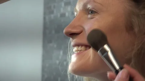 Make-up, close-up, side view, the brush work. Stock-Footage 64656778