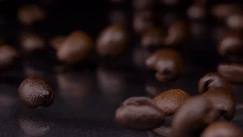 Make Coffee. Super slow motion shot of premium fresh roasted brown coffee beans Vídeos de archivo 147412381
