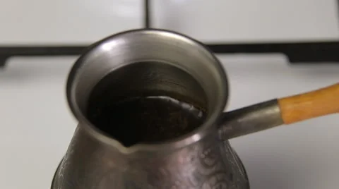 Make coffee in traditional cooper turk Stock Footage 64538403