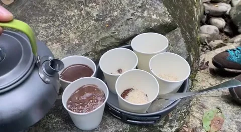 Make coffee by the waterfall Stock Footage 238626330