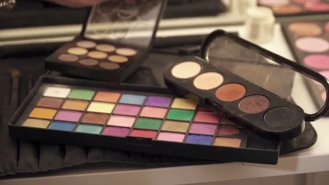 Make-up, colorful eye shadows palette, set of colored shadows for make-up, Macro Stock Footage 73571753