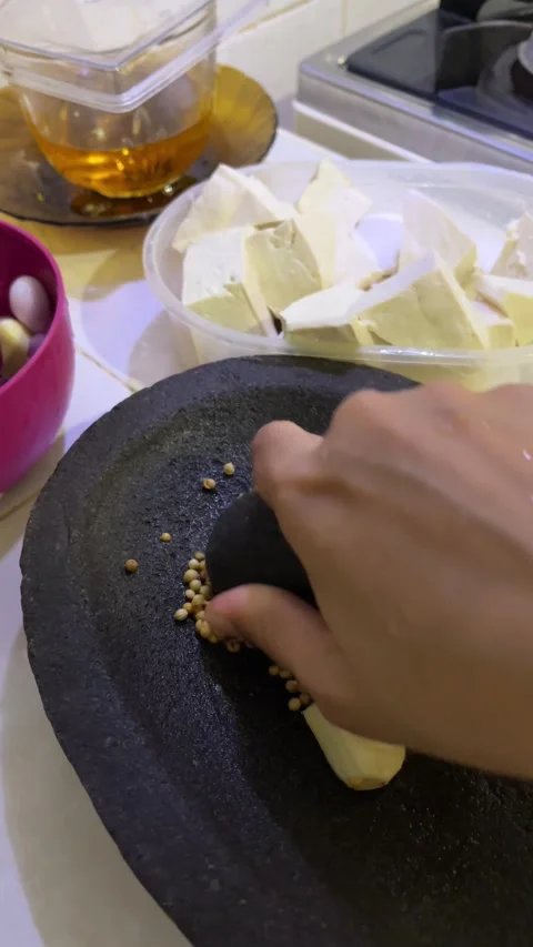 Make cooking spices from garlic and pepper Stock Footage 296454798