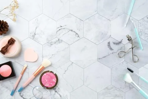 Make up cosmetic flat lay top view on the tile marble white color look clean  Stock Photos