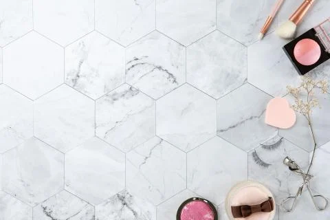Make up cosmetic flat lay top view on the tile marble white color look clean  Stock Photos