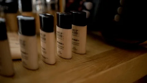 Make-up cosmetics, foundations presented on the table, make-up workshops Stock Footage 121040611